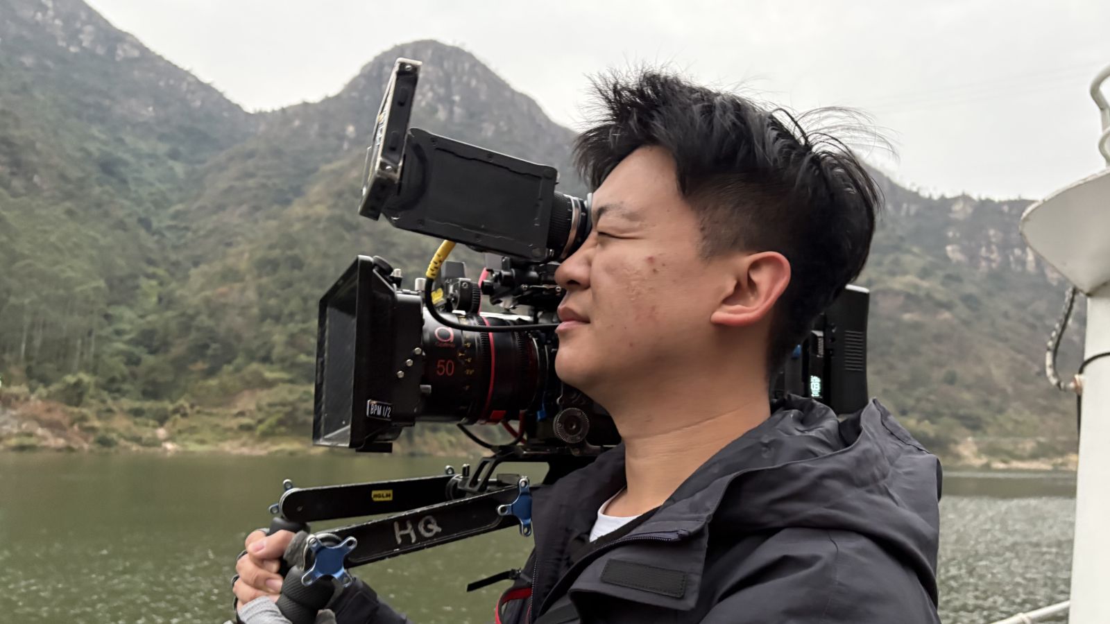 Zhu Yongkang with Camera setup a support with Optimo Prime F75 on it.